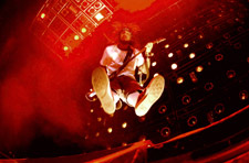 Fieldy bathed in red stage light